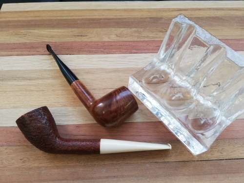 Pipe stand and two pipes