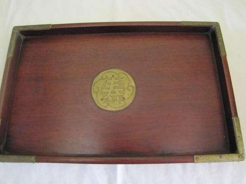 Oriental wooden tray with brass corners