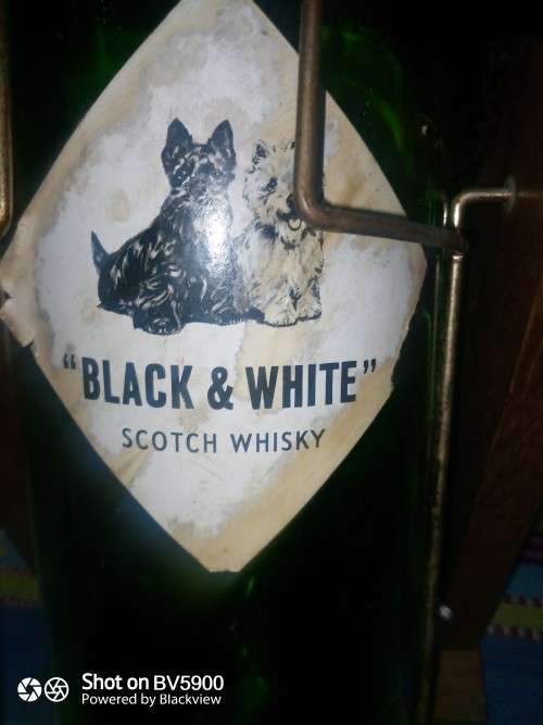 3.75 liter Scotch vintage bottle with wooden stand excellent condition