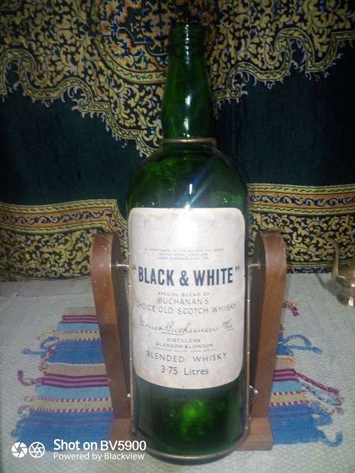 3.75 liter Scotch vintage bottle with wooden stand excellent condition