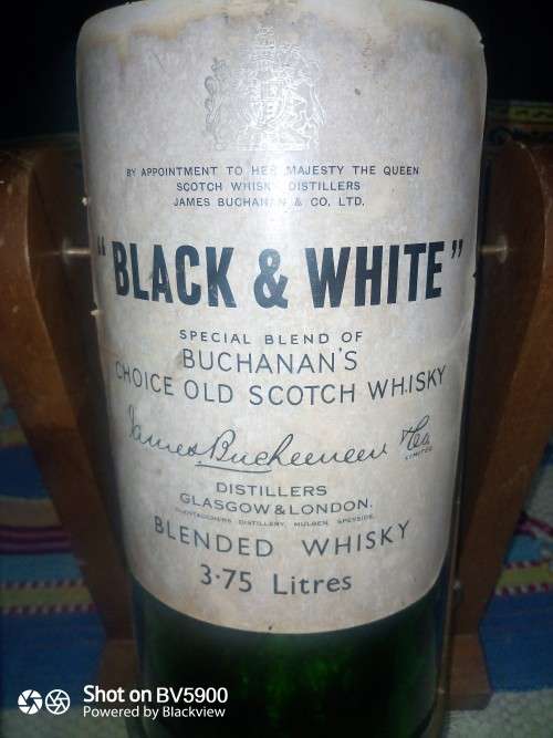 3.75 liter Scotch vintage bottle with wooden stand excellent condition