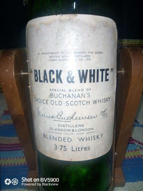 3.75 liter Scotch vintage bottle with wooden stand excellent condition