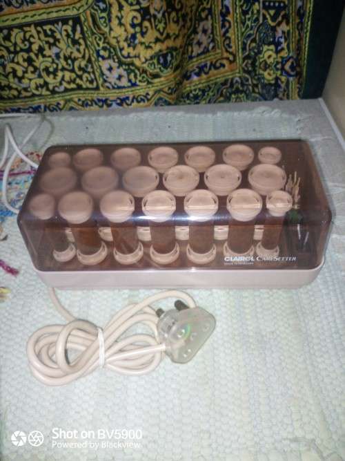 Clairol 21 piece electric curlers with pins