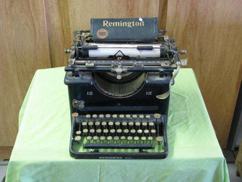 Antique Remington Typewriter "12". Working Condition with ribbon. Needs TLC.
