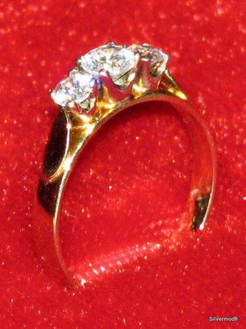Engagement Ring. 3 Created Diamonds Set In 9ct Yellow gold.  View Details.