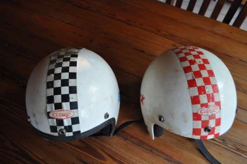 Vintage bicycle safety helmets with BMX stickers