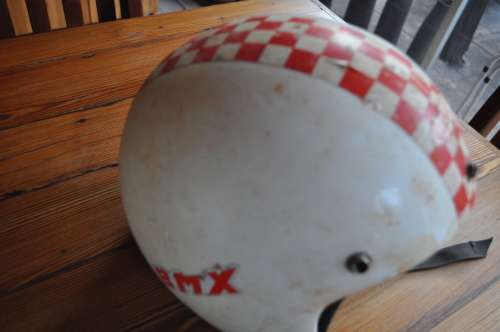 Vintage bicycle safety helmets with BMX stickers