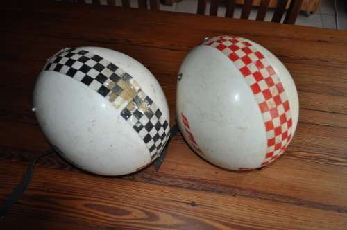 Vintage bicycle safety helmets with BMX stickers