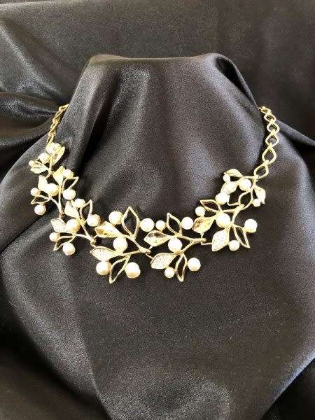 Gold Plated Necklace With White Pearls And Diamante Leaf Design