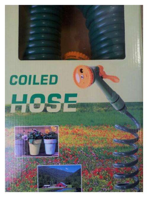 ***NEW***15 M coiled hosed with FREE adjustable spray head included