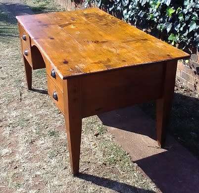 Lovely 1800`s, rustic Oregon desk / table with four drawers, cup handles and thick tapered legs.
