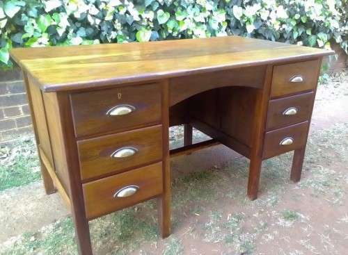 Very pretty, Stinkwood, Ball and Claw desk with five drawers and lovely linnenfold fronts.