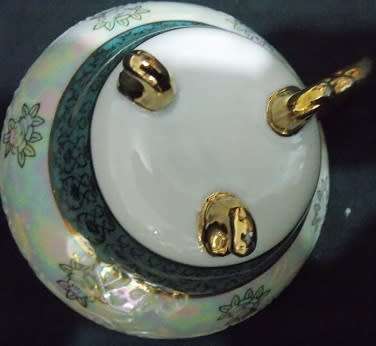 Pearlescent Tea Cup and Saucer
