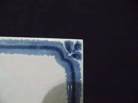 Set of Two Blue and White Tiles