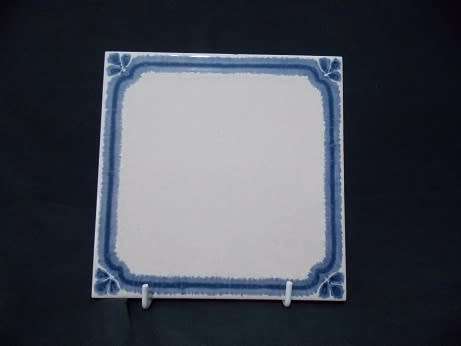 Set of Two Blue and White Tiles