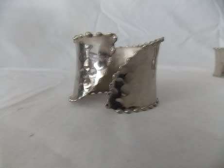 Set of Four Silver Colored Napkin Rings