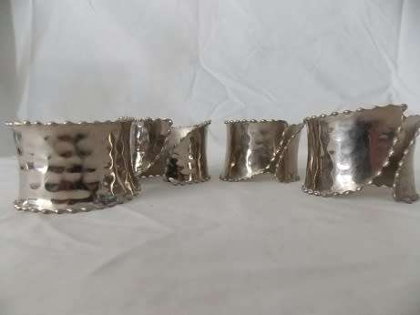 Set of Four Silver Colored Napkin Rings