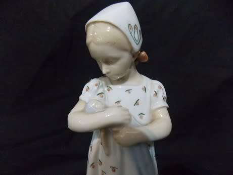 DG Porcelain Figurine