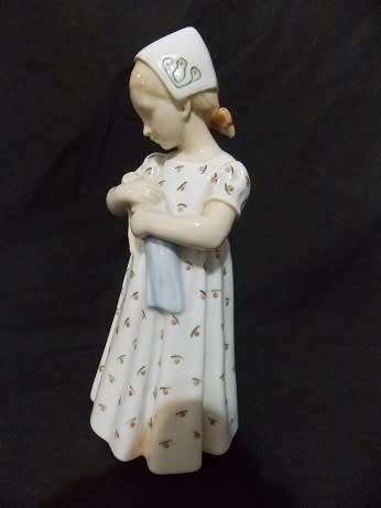 DG Porcelain Figurine