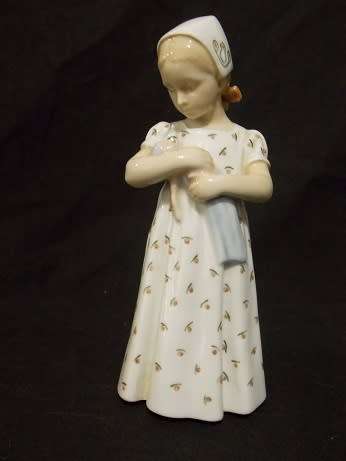 DG Porcelain Figurine