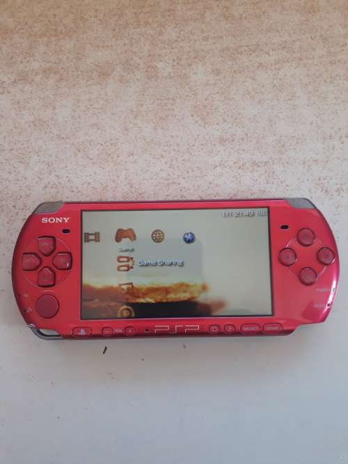 Sony PSP 3000 Slim + 8g memory card And Games