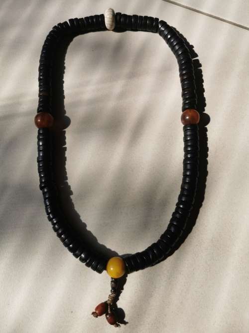 Chinese Qing Dynasty Buddhist mala beads made with 108 rosewood beads including 4 jade beads.
