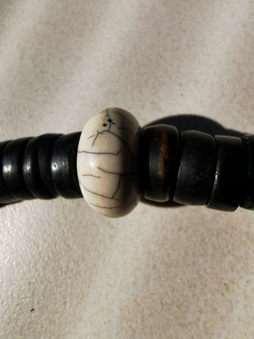 Chinese Qing Dynasty Buddhist mala beads made with 108 rosewood beads including 4 jade beads.