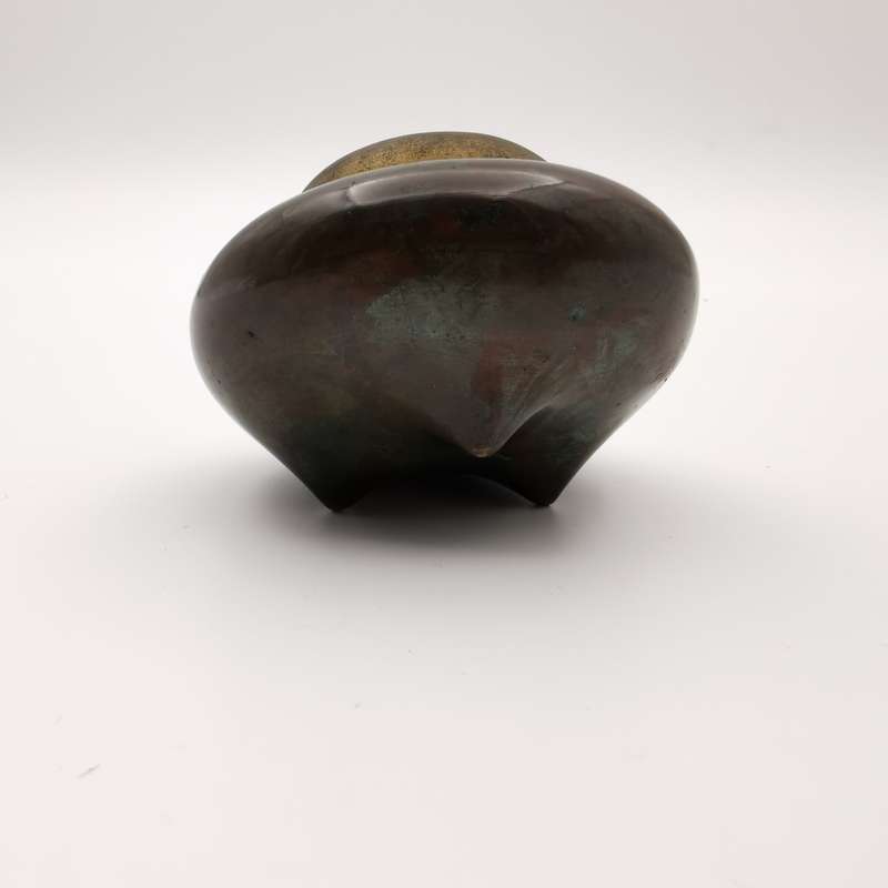 A copper incense burner with a longevity character pattern in the late Qing Dynasty of China