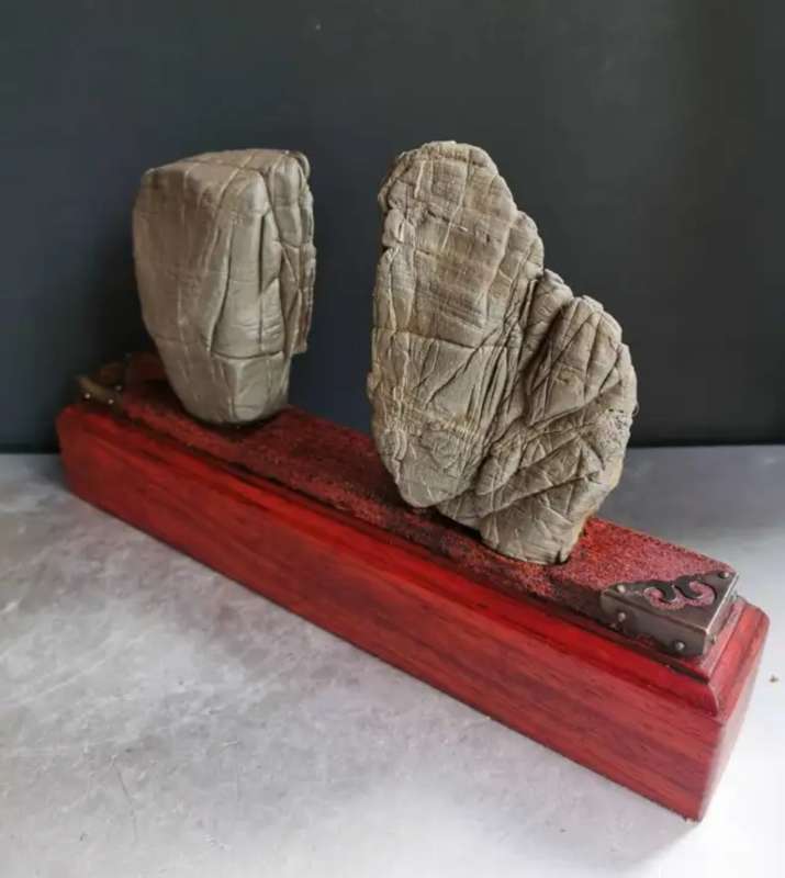 Antique Natural stone ornaments with a rosewood base