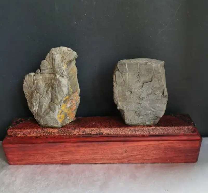 Antique Natural stone ornaments with a rosewood base