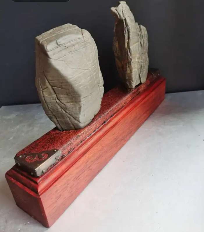 Antique Natural stone ornaments with a rosewood base