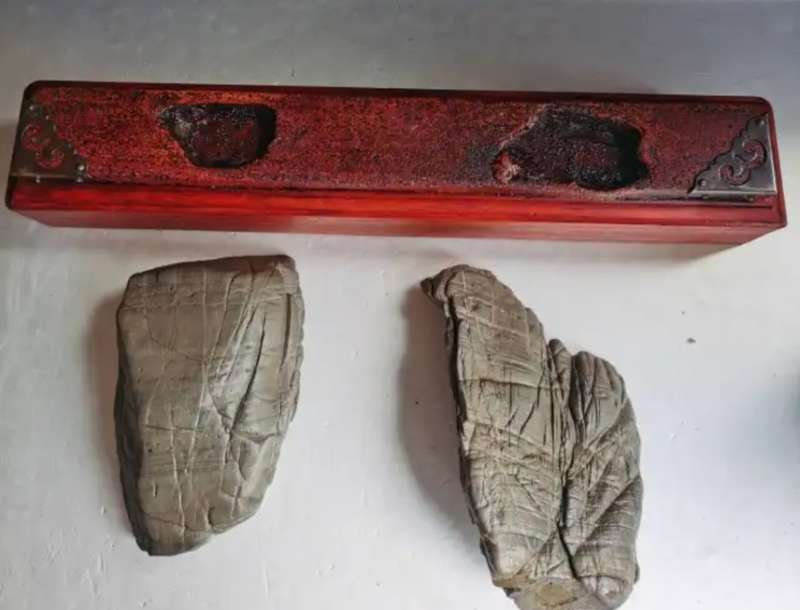 Antique Natural stone ornaments with a rosewood base