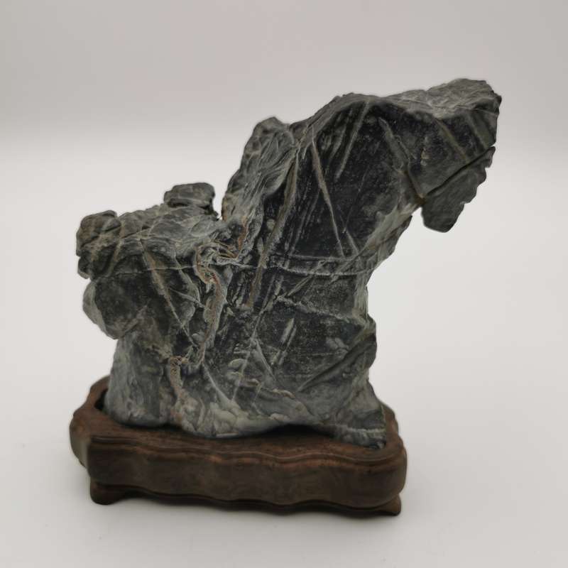 Antique Natural stone ornaments with a rosewood base