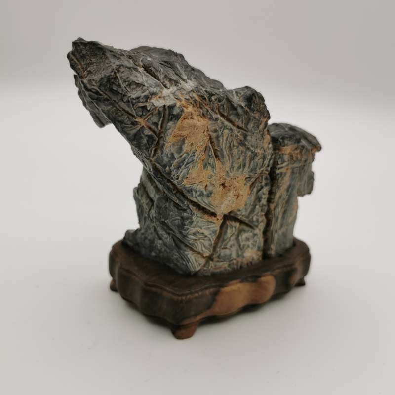 Antique Natural stone ornaments with a rosewood base