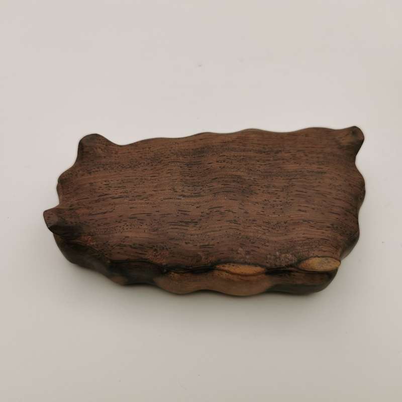 Antique Natural stone ornaments with a rosewood base