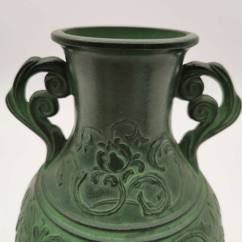 SOLID BRONZE ANTIQUE CHINESE VASE WITH RAISED RELIEF DECORATION.
