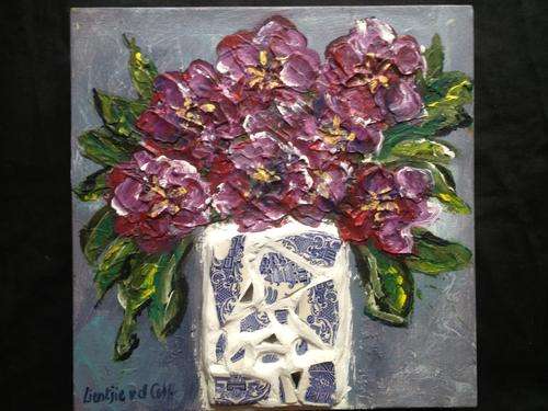 Mosaic pot with flowers