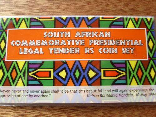 Set of three Mandela coins in folder 1994 2000 2008 no 76 of 150