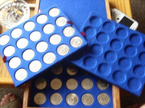 COLLECTION OF 40 ONE RAND COINS IN FANTASTIC DISPLAY BOX INC