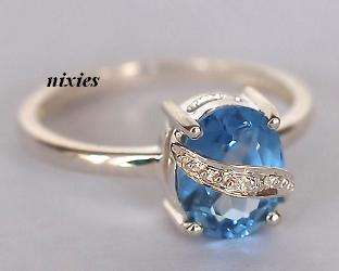LOVELY 925 STERLING SILVER BLUE TOPAZ CZ RING - SIZE 9(S)