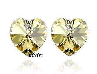 LOVELY SOFT CITRINE SWAROVSKI HEART STUDS