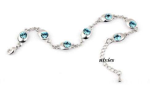 DAZZLING BLUE TOPAZ SWAROVSKI TENNIS BRACELET
