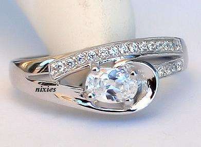 AWESOME SIMULATED DIAMOND CZ ENGAGEMENT RING - SIZE 8(Q)