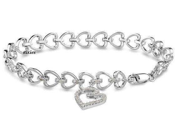 BEAUTIFUL PLATINUM CLAD TENNIS BRACELET WITH CR DIAMOND LINKS &CHARM