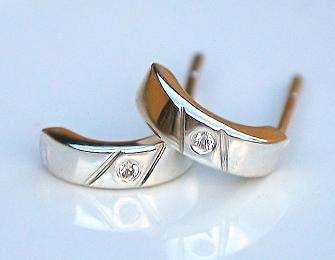 TWO STUNNING STERLING SILVER HOOPS WITH TINY CZ STONES