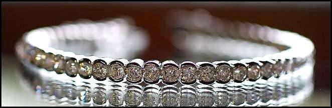 XQUISITE 925 STERLING SILVER DIAMOND BRACELET