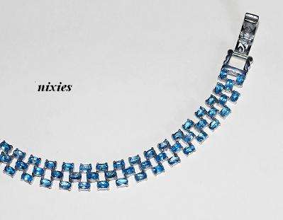 XQUISITE SWISS BLUE TOPAS IN SOLID 925 STERLING SILVER