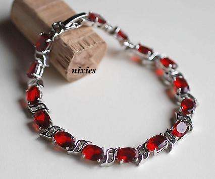 LOVELY  WHITE GOLD GARNET BRACELET