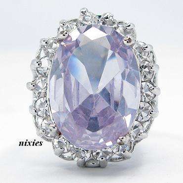 STRIKING WHITE GOLD TANZANITE RING - SIZE 7(O)