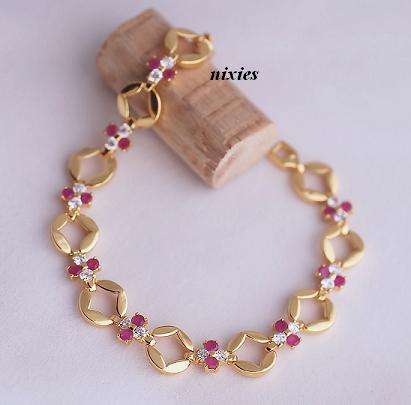 GORGEOUS FEMININE YELLOW GOLD RUBY BRACELET
